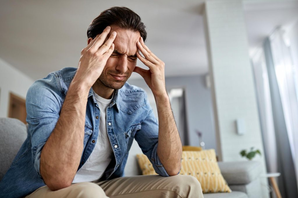 Chronic migraines can impair daily life due to their symptoms, like nausea and light sensitivity.